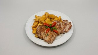 File svinjskog lungića sa žara s prilogom