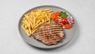 Teleći odrezak sa žara s prilogom