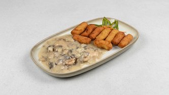Pileći medaljoni u umaku od šampinjona s kroketima